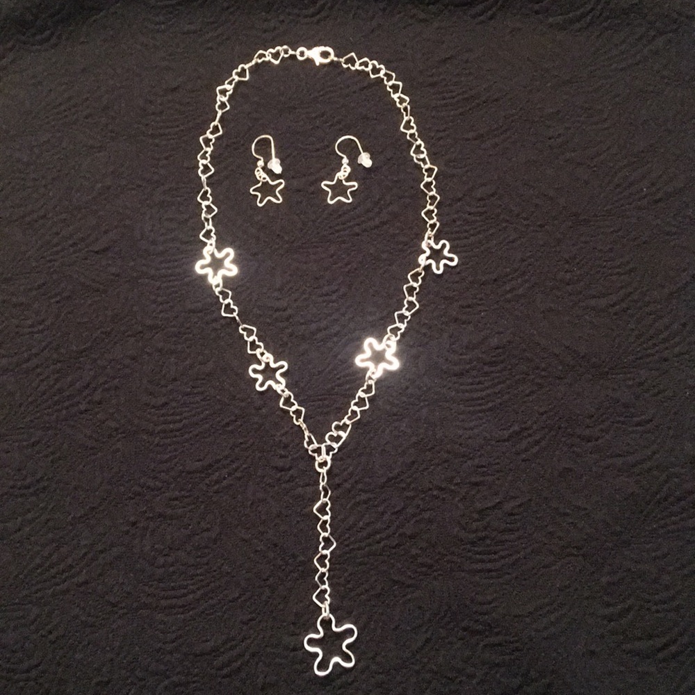 Sterling silver necklace and matching earrings.